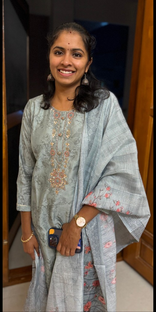 Mahalakshmi in a warm traditional outfit